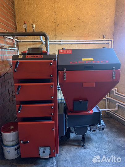 Автоматический твердотоплевный котел Defro