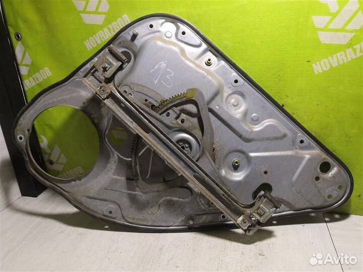 Стеклоподъемник механ. задний левый Ford Focus 2