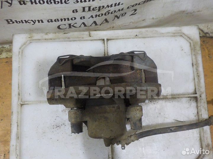 Суппорт тормозной передний левый Mazda 3