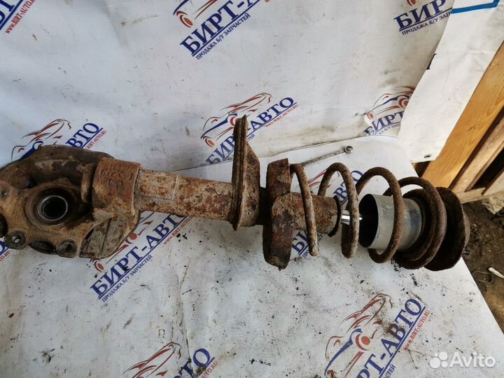 Стойка амортизатора переднего левого Daewoo Nexia