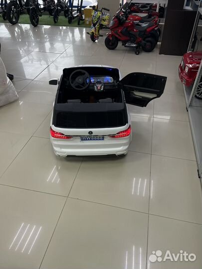 Детский электромобиль двухместный