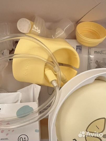 Молокоотсос medela электрический