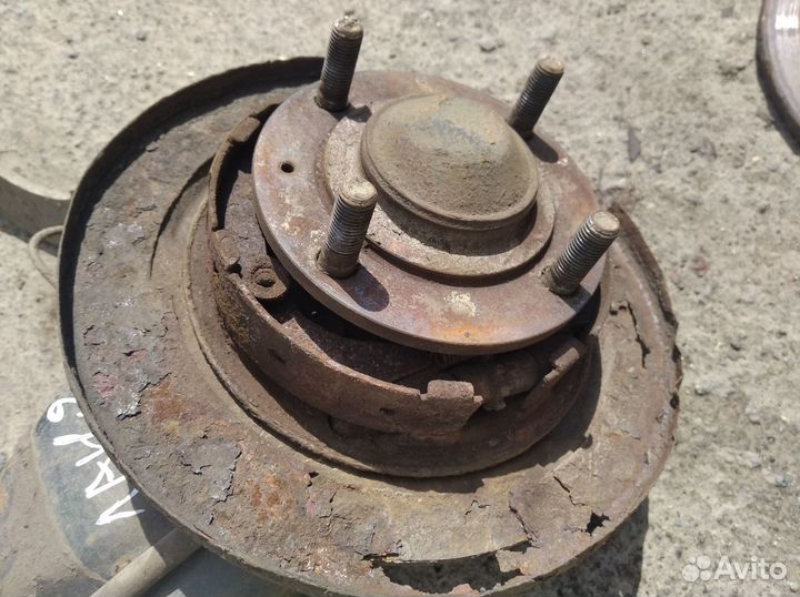 Задний левый кулак Митцубиси лансер 9