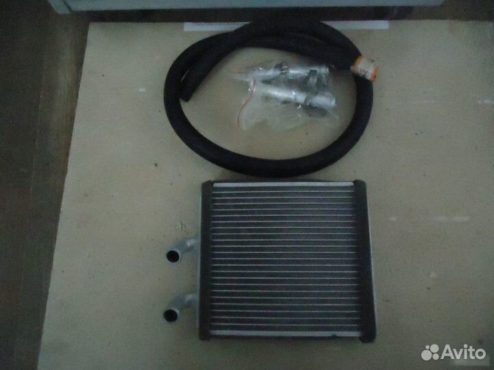 Радиатор печки Mazda Demio