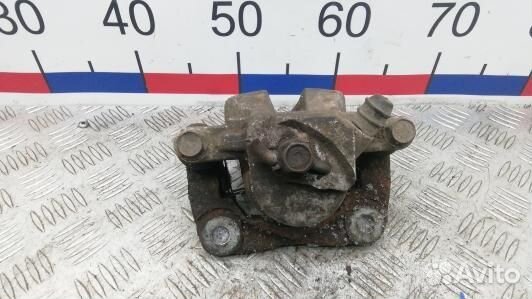 Суппорт тормозной задний левый toyota RAV 4 ZSA3