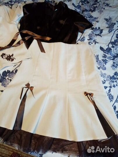 Костюмы женские