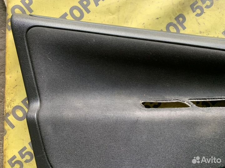 Обшивка двери передней левой Peugeot 207