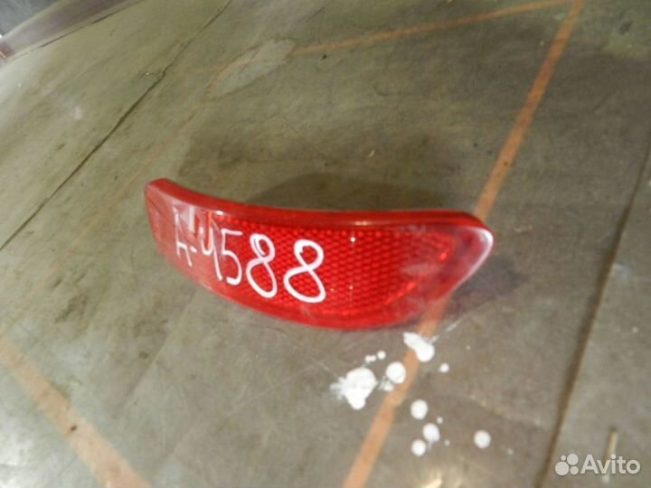 Отражатель бампера заднего левый- Renault Logan 1