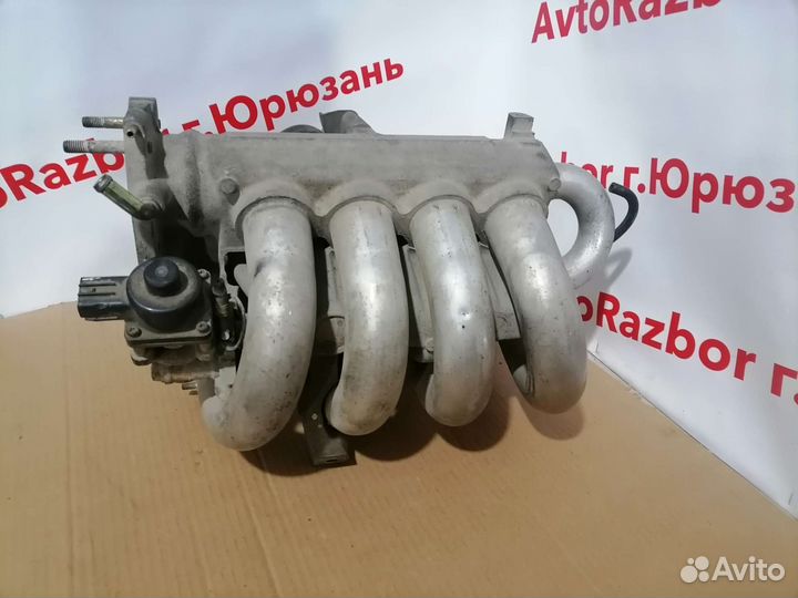 Колектор выпускной Mazda Familia 1.5 ZL