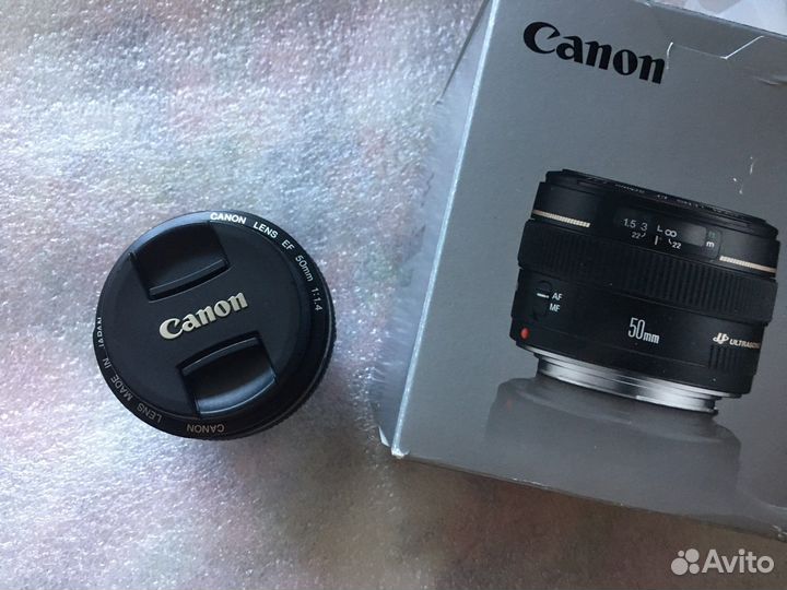 Новый. Canon 50mm 1.4