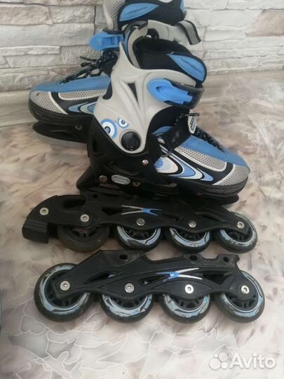 Роликовые коньки