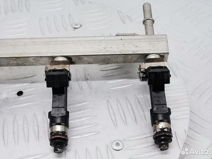 Форсунка Opel Corsa D рест. 2011 24420543