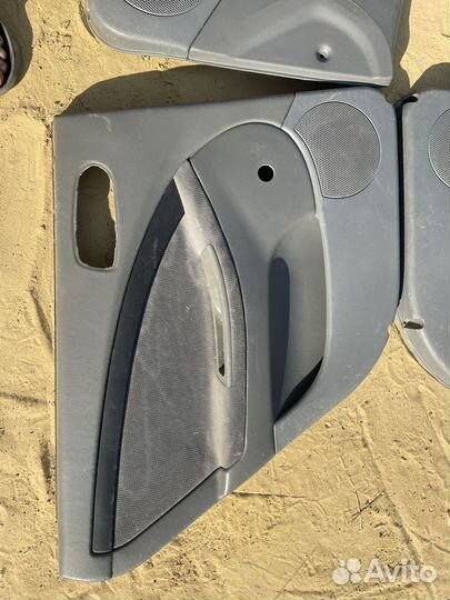 Шевроле Лачети обшивки дверей