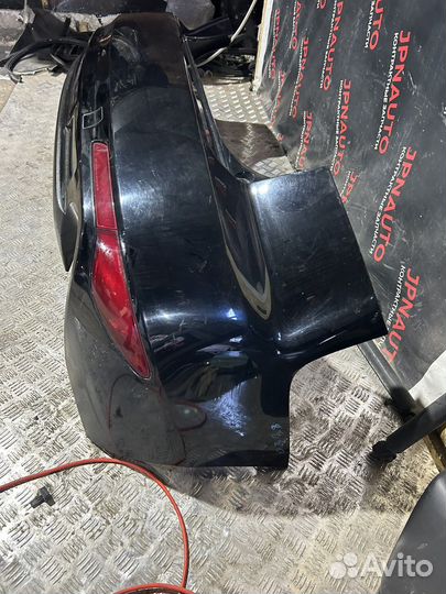 Задний бампер Mazda CX-7