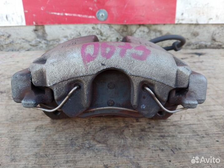 Суппорт тормозной передний левый Volvo S60 I 2.4