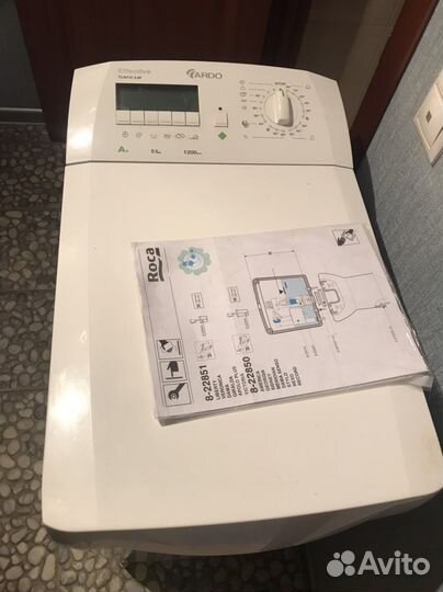 Стиральная машинка с вертикальной загрузкой