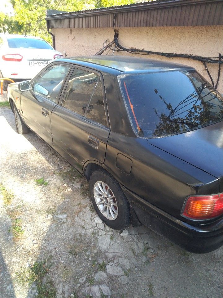 Mazda Familia: фото владельца