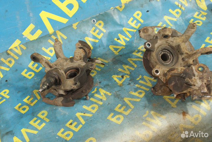 Поворотный кулак Nissan Primera P10