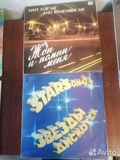 Виниловые пластинки и проигрыватель