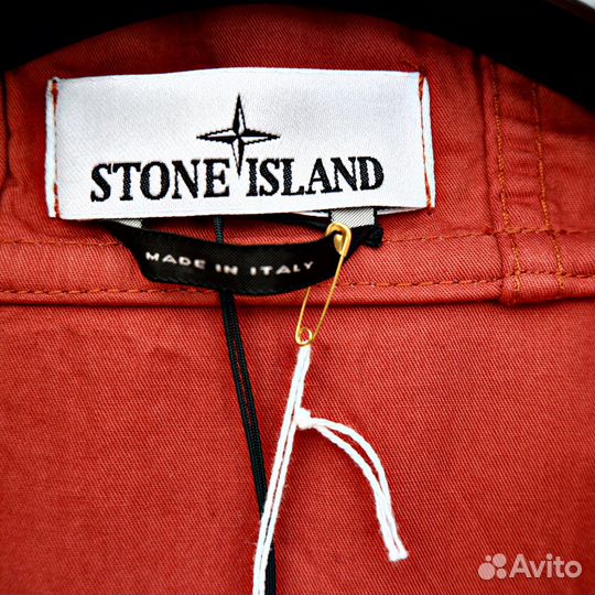 Stone island camouflage print hooded jacket