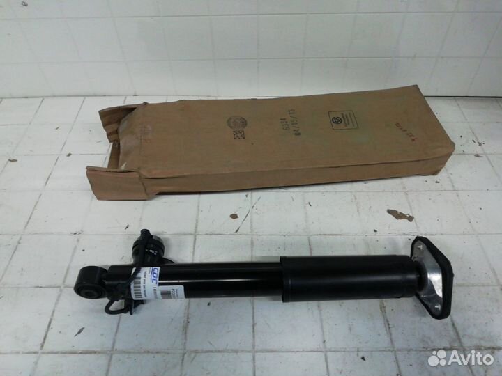 Амортизатор Новый Оригинал задний левый Cadillac