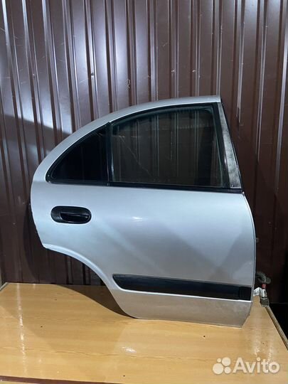 Задняя правая дверь на ниссан альмера н16