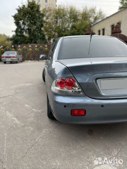 Mitsubishi Lancer 1.6 AT, 2006, 170 000 км