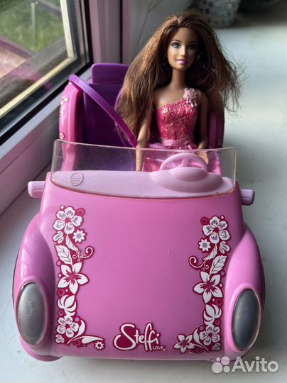 Кукла барби на машине