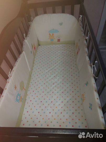 Детская кроватка с универсальным маятником