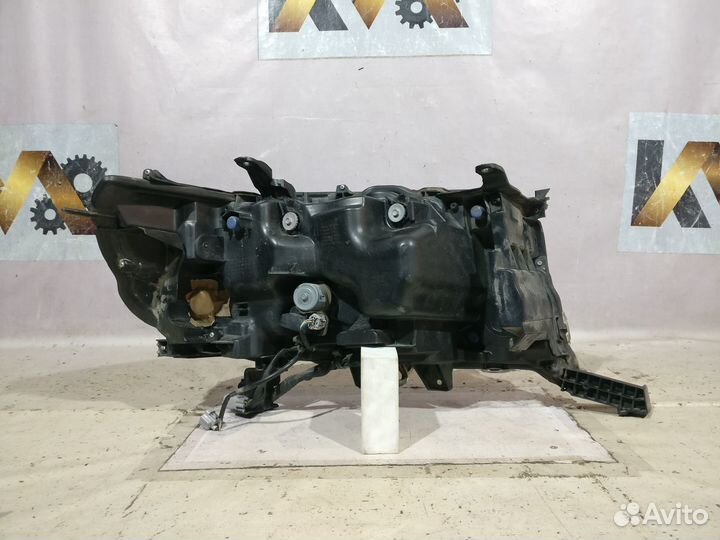 Фара Левая 15- Toyota Land Cruiser 200 Бу оригинал