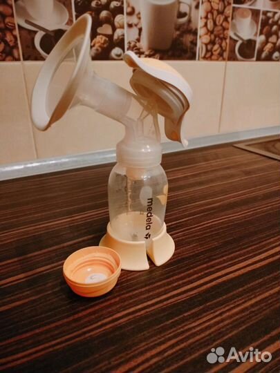Молокоотсос medela ручной
