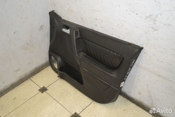 Обшивка двери передняя правая Opel Astra G