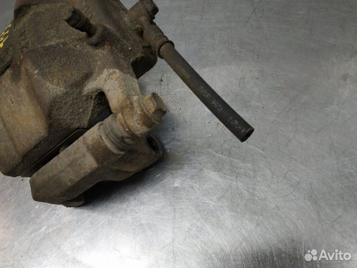 Суппорт передний левый Nissan X-Trail T31 MR20DE