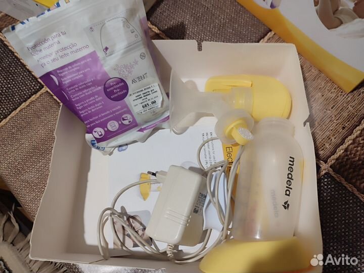 Молокоотсос электрический Medela mini electric