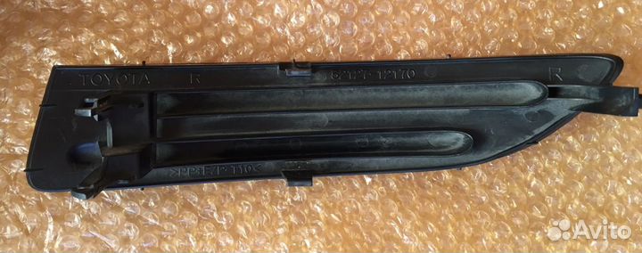 Заглушка птф фары правая Toyota Corolla