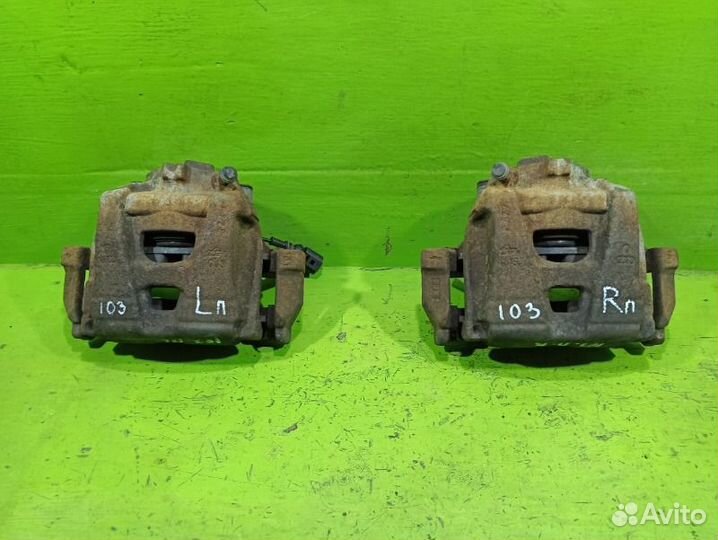 Суппорт тормозной передний Volkswagen Tiguan NF