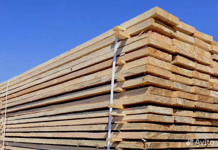 Доски лиственницы 35x130 мм, прошедшие строгательн