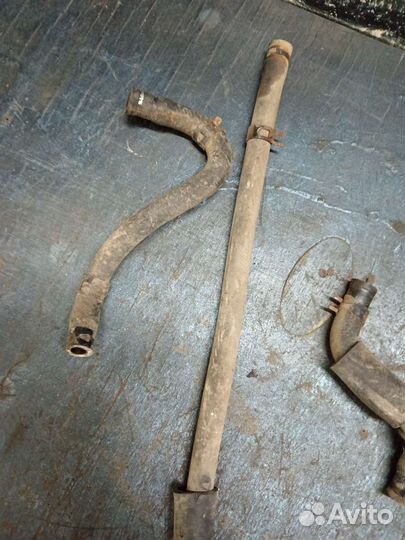 Патрубок коллектора Kia Spectra