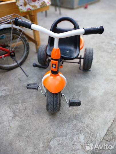 Трехколесный велосипед с ручкой