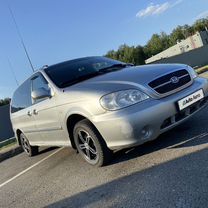 Kia Carnival 2.5 AT, 2005, 200 000 км, с пробегом, цена 399 000 руб.