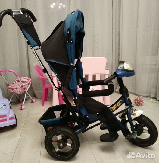 Трехколесный велосипед с ручкой
