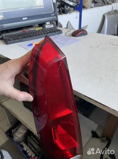 Фонарь задний левый Ford Fiesta MK5 5 дверей