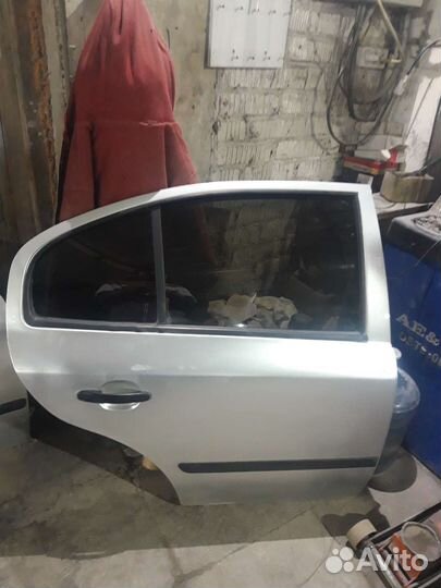 Двери левые skoda octavia тур