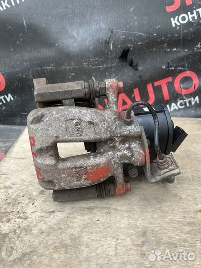 Суппорт задний левый Volkswagen Passat B6