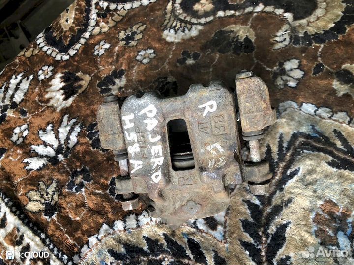 Суппорт на mitsubishi pajero junior H57A 4A31