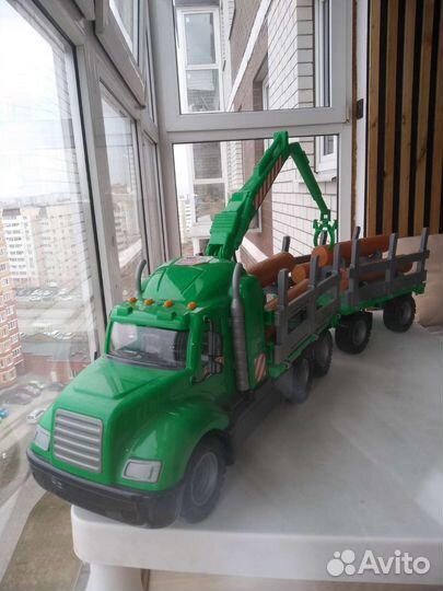 Лесовоз с прицепом брёвнами Полесье