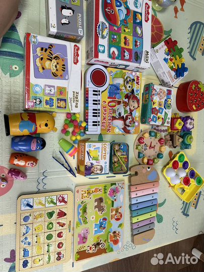 Игрушки пазлы развивающие