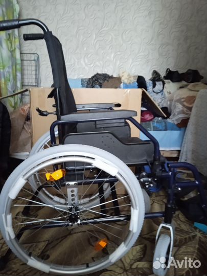 Инвалидная коляска