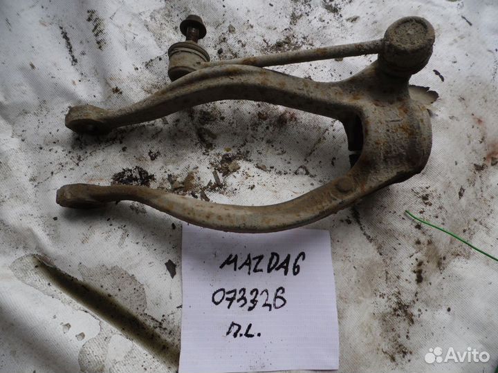 Кронштейн амортизатора (передний левый) Mazda Mazd