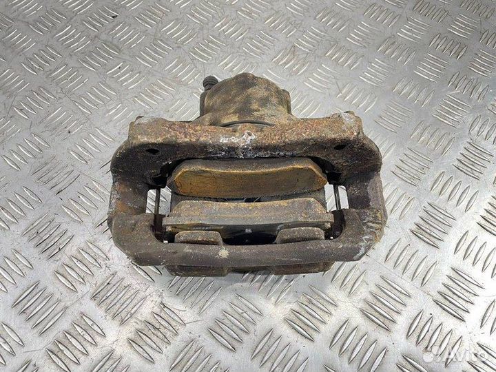 Суппорт тормозной передний левый Opel Astra J